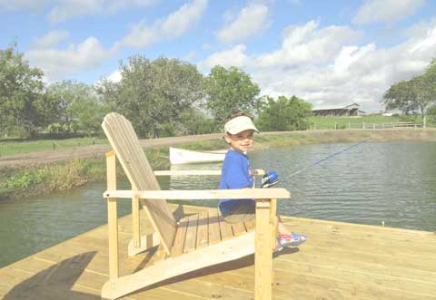 Little Girl Fishing on the River